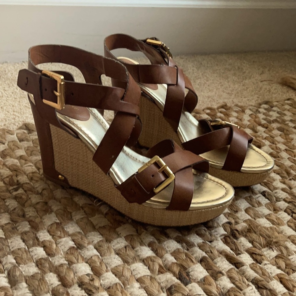 Leather cross strapped wedges.
